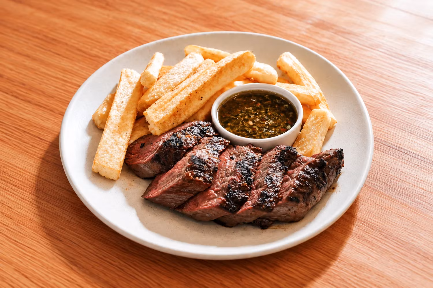 8oz USDA prime steak with golden fries and herb sauce at Chapel Street