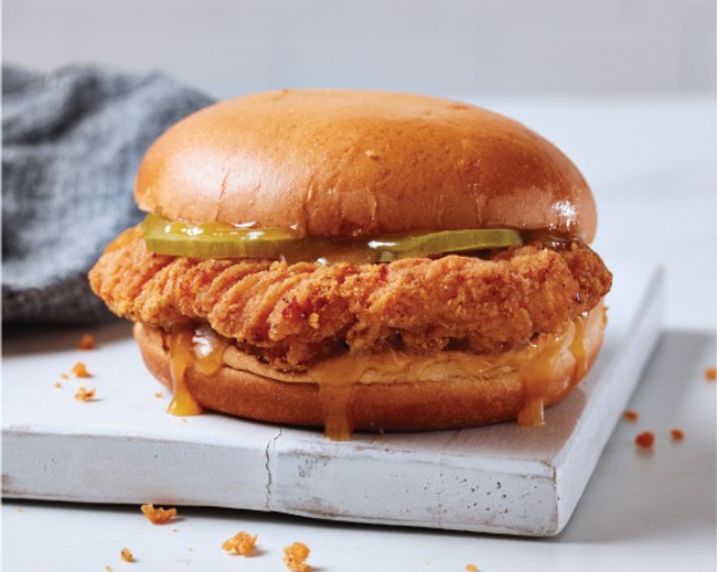 Halal Cajun Chicken Sandwich, regular fries, biscuit, and soda