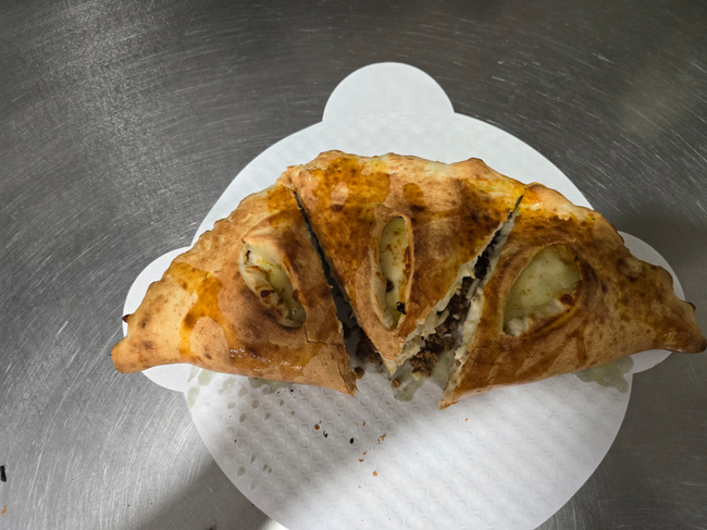 Deluxe Calzone (Pepperoni, Sausage, Onions, Green Peppers, Mushrooms)