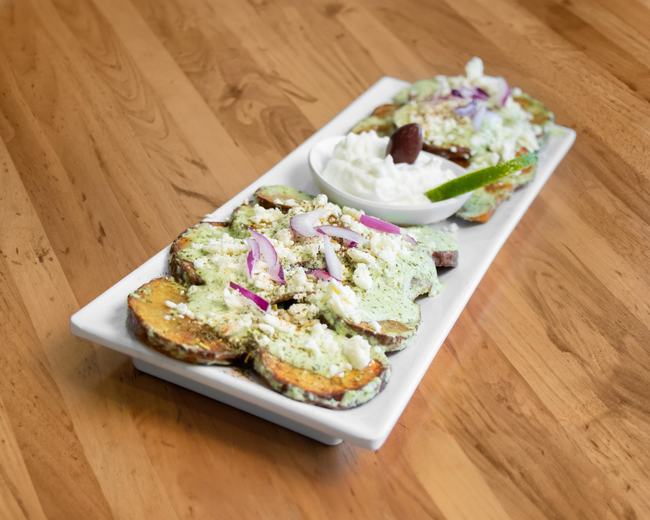 Potatoes slices in Cilantro sauce w/ feta