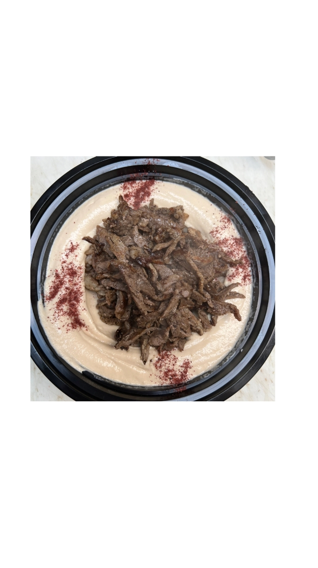 Steak Shawarma over Hummus