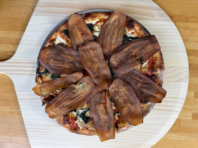 18” Edge of the Woods:  sauteed spinach, caramelized onions, ricotta, fried eggplant