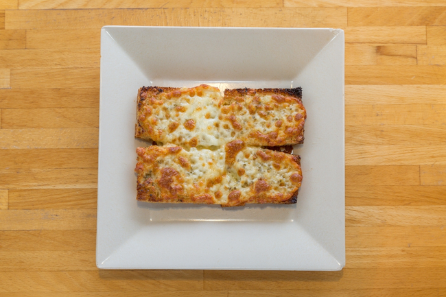 Cheese Bread:   house-made focaccia bread baked with garlic butter and mozzarella cheese