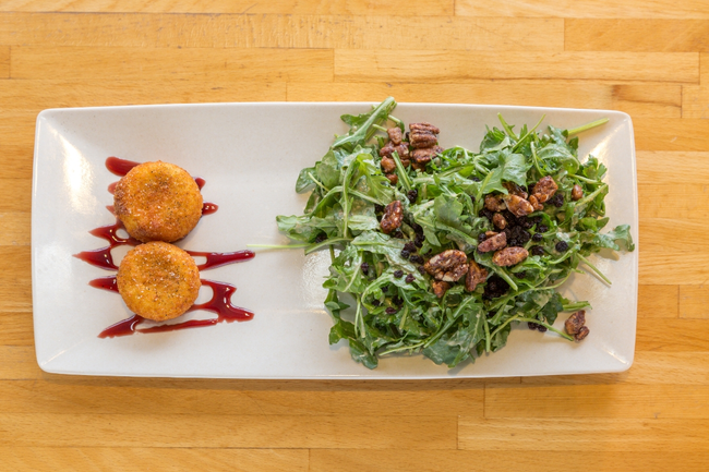 LG. Crispy Goat Cheese:  herb greens, candied pecans, dried currants, house-made shallot vinaigrette