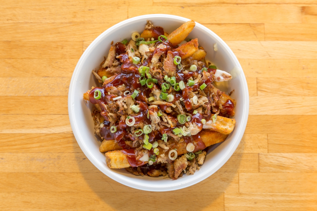 BBQ Pulled Pork Fries: pulled pork, smoked provolone cheese sauce, scallions