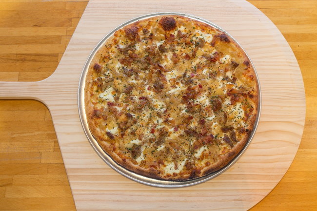18” Metro-North:  white pizza, smoked pulled pork, caramelized onions, ricotta, bacon