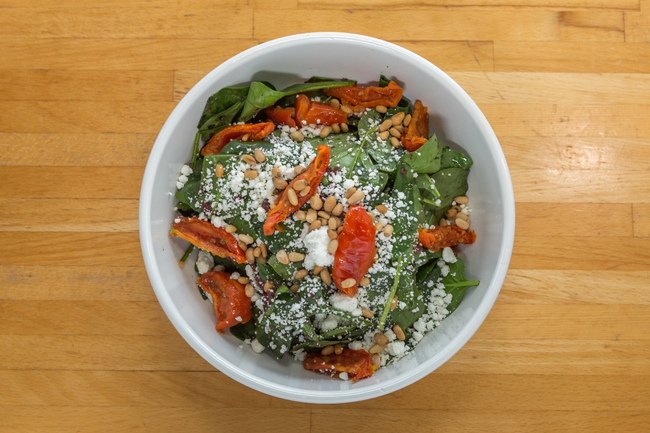 LG. Spinach Olivada Salad:  goat cheese, oven-dried tomatoes, pine nuts, house-made olivada dressing