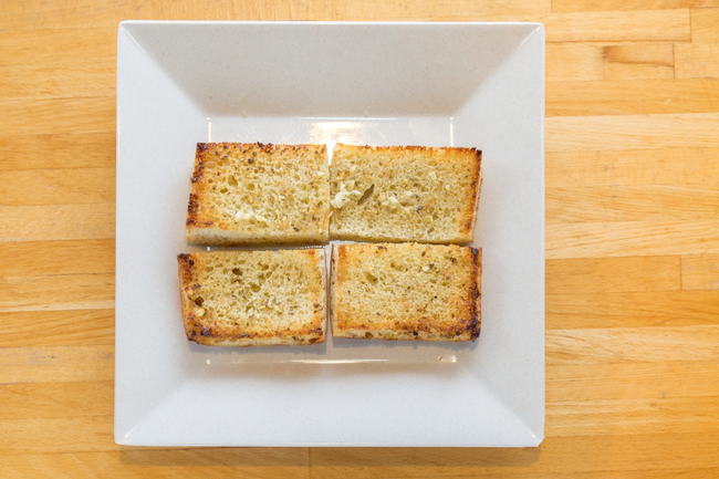 Garlic Bread:  house-made focaccia bread baked with garlic butter