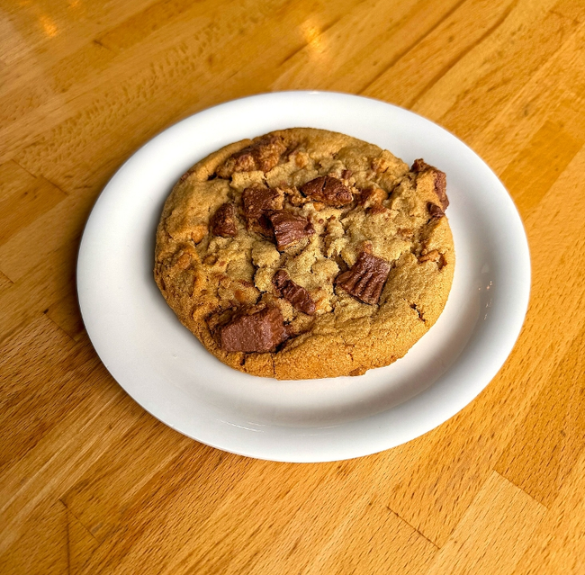Stuff Your Face Peanut Butter Cookie: Creamy peanut butter cookie dough is loaded with peanut butter chips and topped with chunks of REESE’S® Peanut Butter Cups