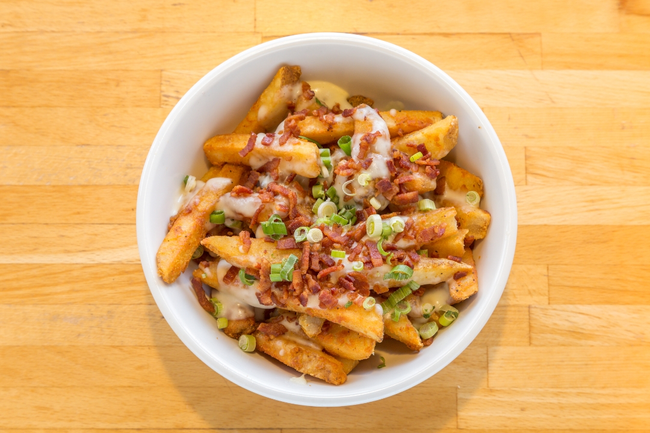 Loaded Fries: bacon, smoked provolone cheese sauce, scallions