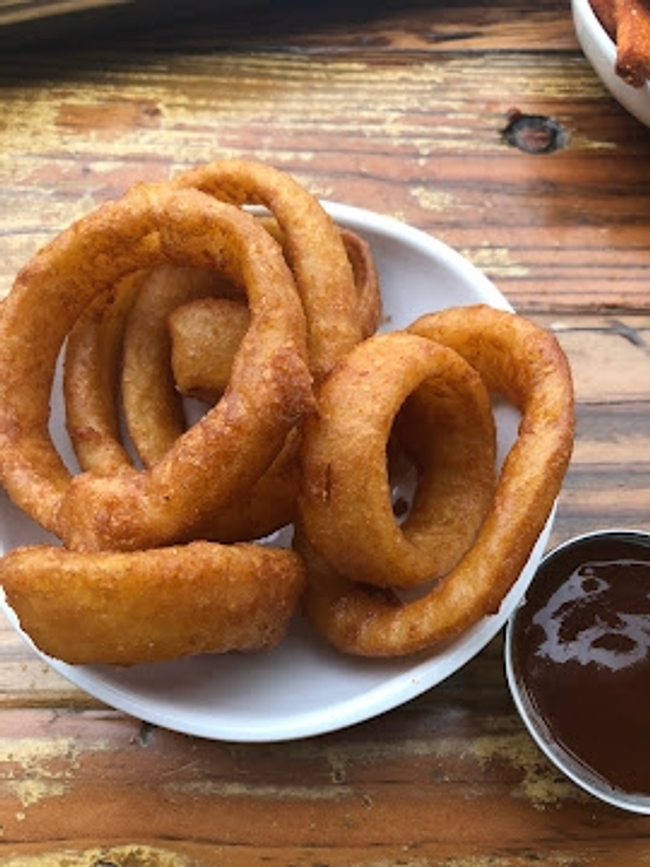 Beer Battered Onion Rings with House-made BBQ sauce
