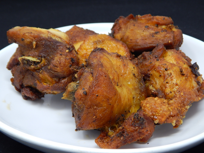Serving Chicharron de pollo - 11pc.