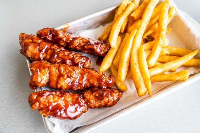 Tossed Chicken Tenders (4) & Fries