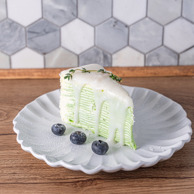 YOUNG COCONUT PANDAN CREPE CAKE (Slice)