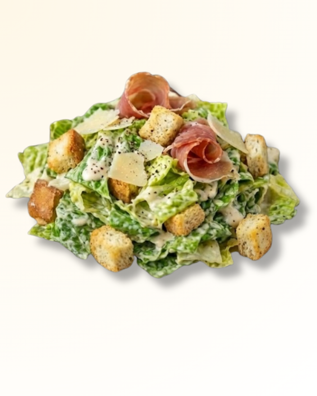 Caesar Salad topped with Prosciutto