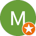 M B