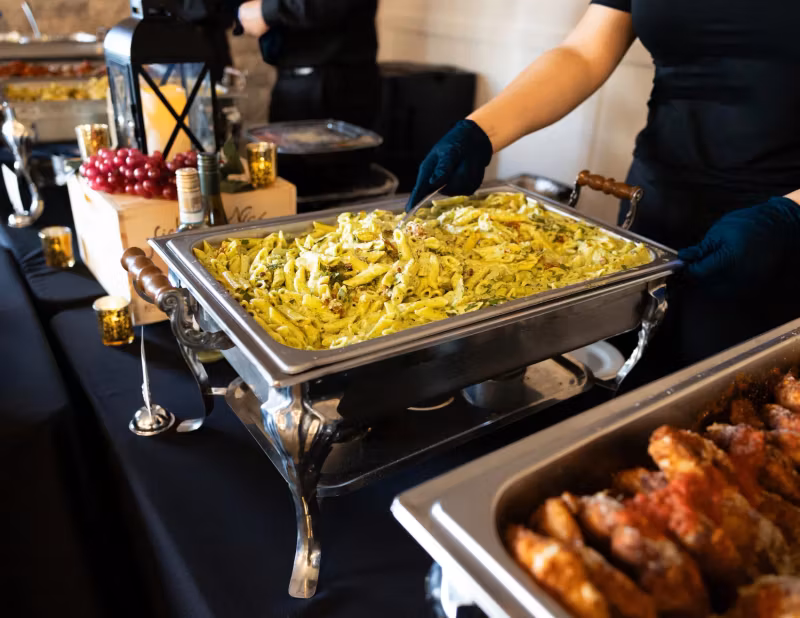 Serving pasta from a chafing dish