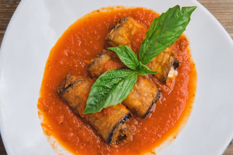 Rotolo basilico eggplant rolls in tomato sauce with basil
