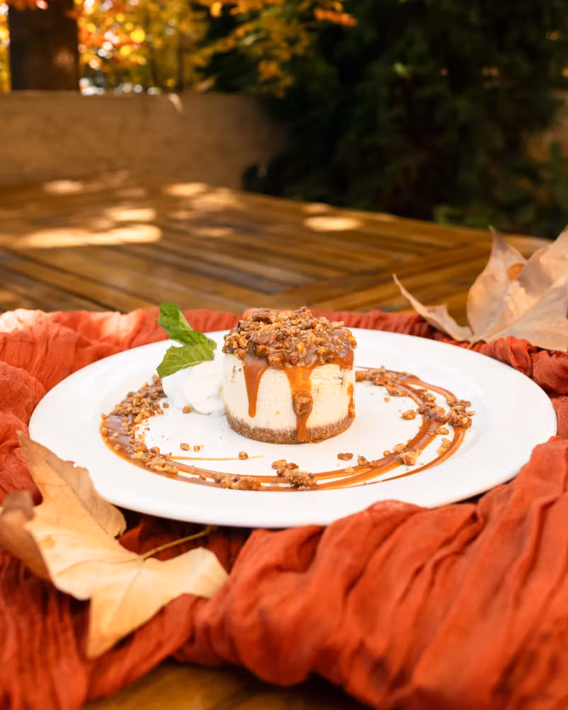 Pecan Crunch Cheesecake with caramel drizzle