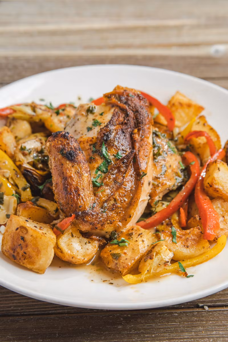 Roasted chicken with peppers and roasted potatoes