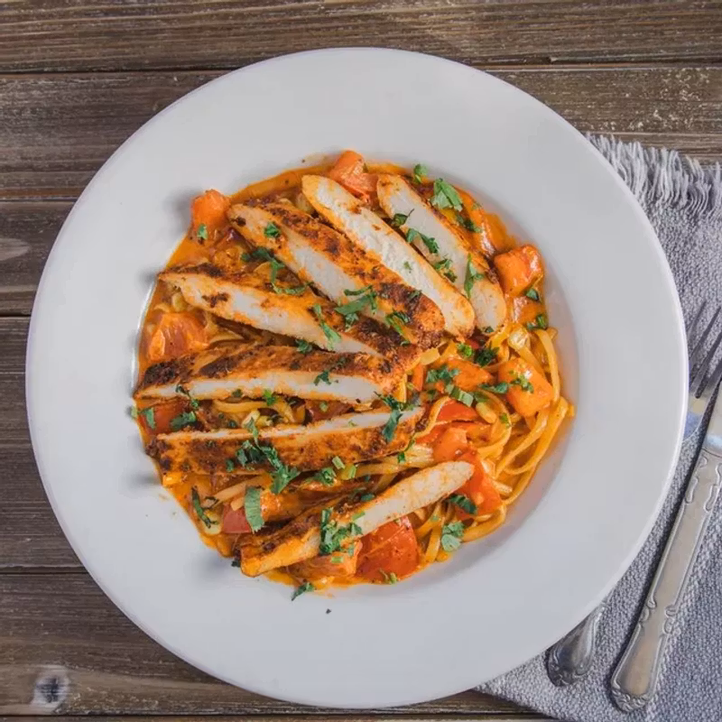 Chipotle linguine with blackened chicken, peppers, and chipotle cream sauce