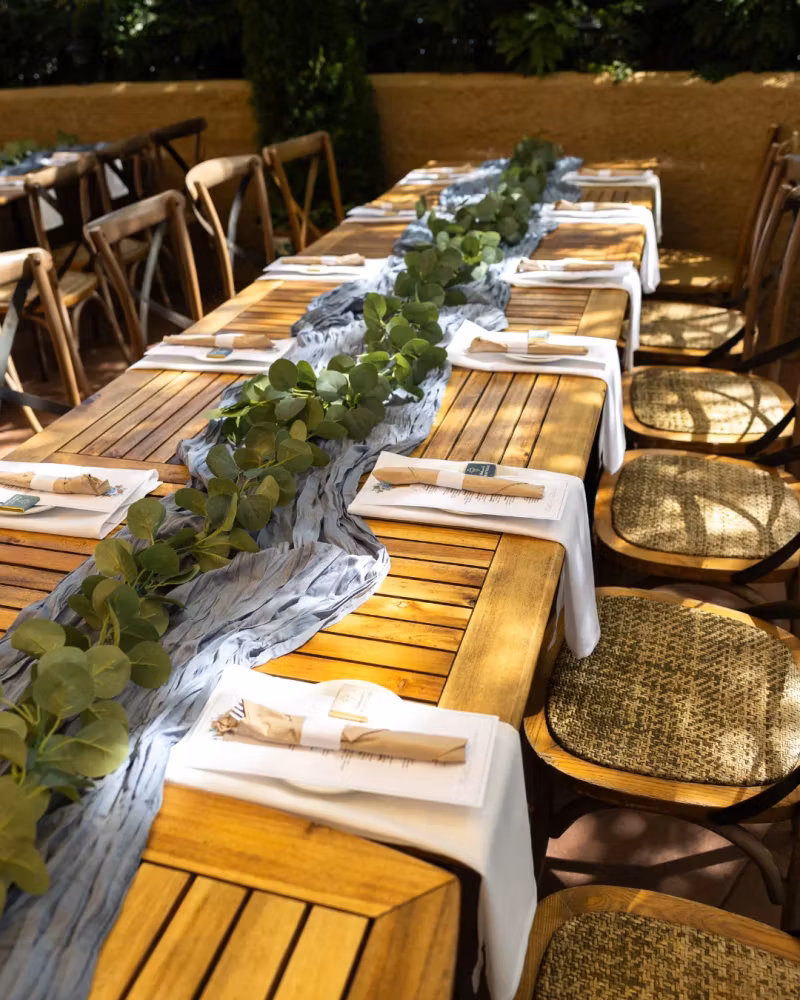 Long patio table dressed for a private party
